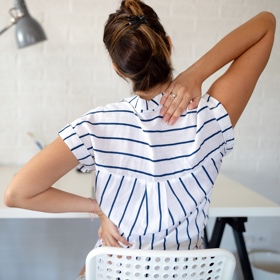 SH Health stiff at desk