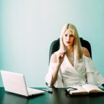 SH Health Business woman at desk