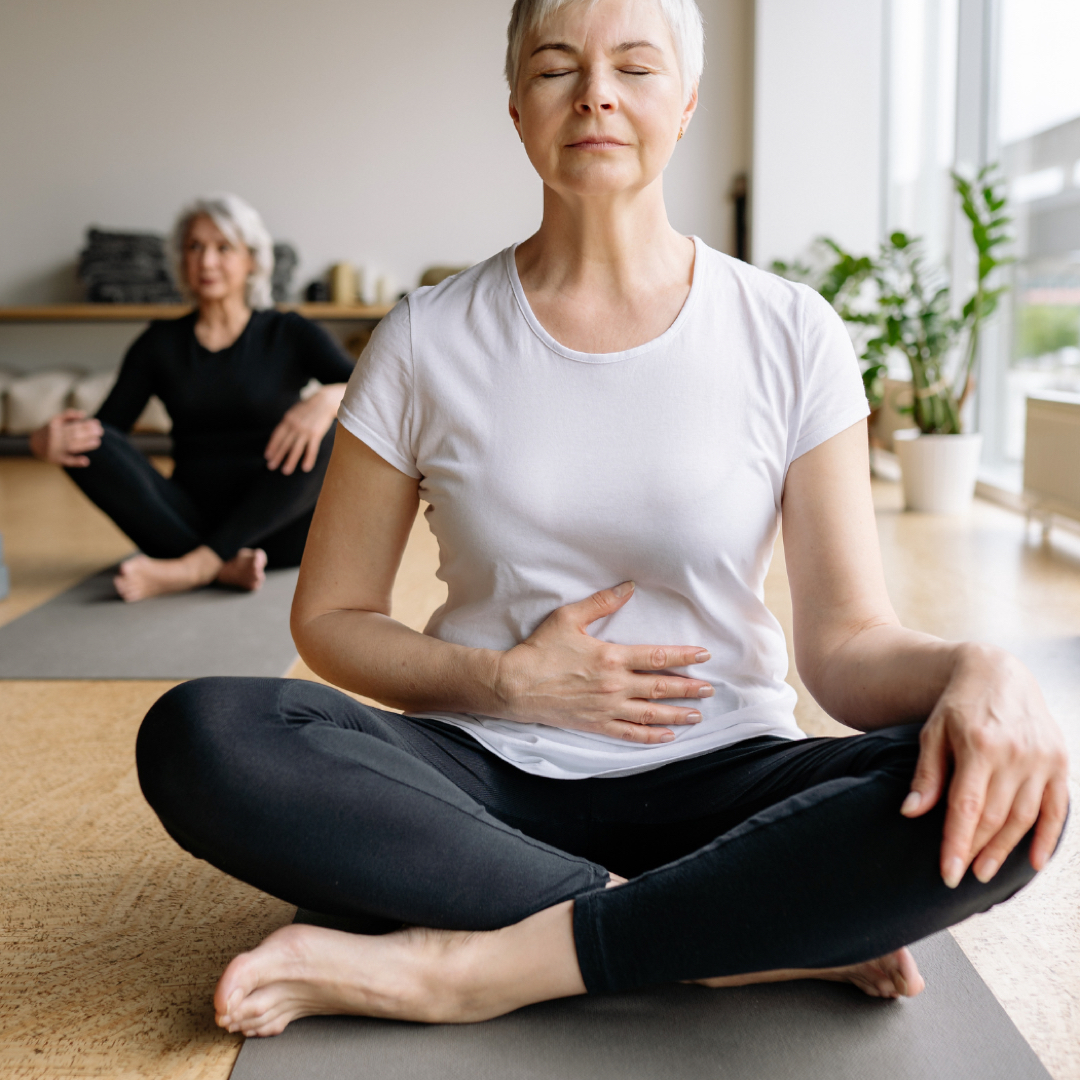 SG Health mature woman yoga